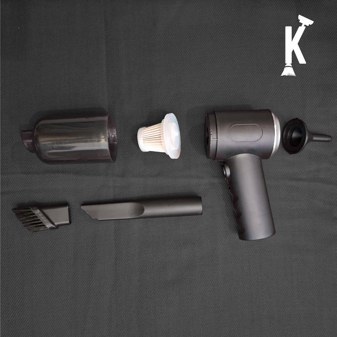 Vacuum cleaner with attachments on a black background