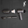 Vacuum cleaner with attachments on a black background